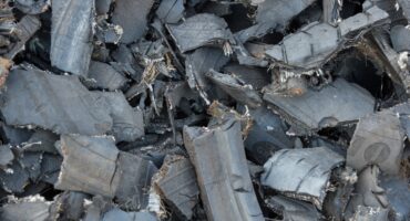 Shredded,Tire,Pieces,To,Be,Recycled,Into,Piles,Of,Rubber